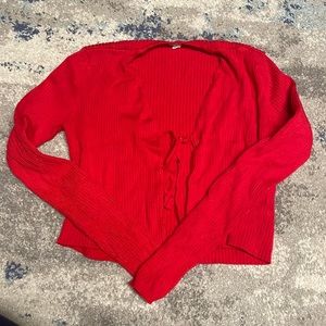 Red tie in the front sweater